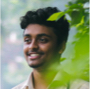 person smiling into the distance